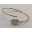 Felül nyitott alul rugósan nyíló arany karkötő, melynek díszítése egy gyönyörüen megformázott cirkon kővel díszített kígyófej van