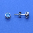 Buttonos foglalatú világoskék cirkon köves ezüst fülbevaló