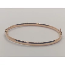 Teljesen letisztult, sima kívül-belül kissé domború tükröfényes,  zsanérral és biztonsági zárral ellátott, rose arany kar reif