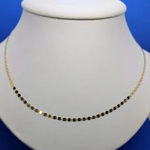 Flittere emlékeztető szemekből készített magas fényű arany lánc