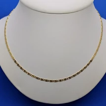 Csiga alakban kialakított szemekből készült nagyon mutatós arany lánc