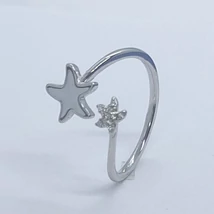 Nyitott fejrésszel készített két végén tengeri csillagot formázó ezüst gyűrű
