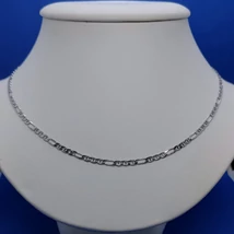 3+1 szemes magas fényű kissé lapos csiszolt figaró ezüst lánc