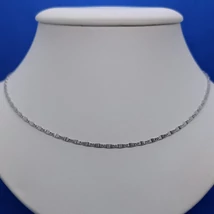 Magas fényű rövid pálcákból pálcákból összerakott ezüst lánc