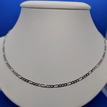 Magas fényű 3+1 szemes kissé laposra csiszolt elegáns férfi figaró ezüst lánc